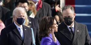 Kamala Harris is sworn in as Vice-President by Supreme Court Justice Sonia Sotomayor as her husband,Doug Emhoff,holds the Bible.