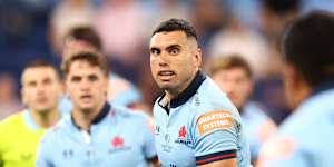 Jack Debreczeni on the attack for the Waratahs against the Blues.