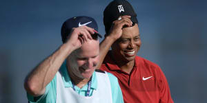 Fan sues Tiger Woods and caddie for alleged shove