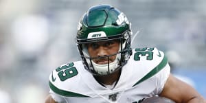 Valentine Holmes has been switched from running back to wide receiver with the Jets'practice squad.