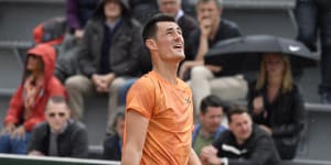 'Pretty sure I tried':Tomic denies French Open tank in 82-minute loss