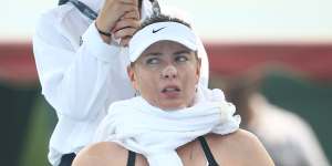 Maria Sharapova seen struggling with the heat between games.