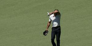 Aussie stumbles,Day’s fashion policed as Woods suffers Masters meltdown