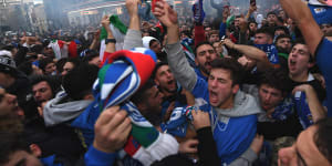 Italian soccer fans celebrate on Lygon Street,Carlton.