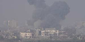 Smoke rises following an Israeli airstrike in the Gaza Strip,as seen from southern Israel.