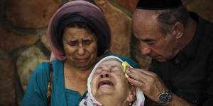 The mother of Albert Alon Govberg,who was shot dead in an attack on a bus,at his funeral in Jerusalem on Wednesday.