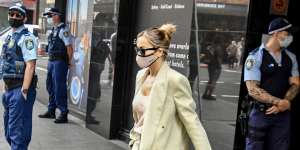 Rita Ora leaves hotel quarantine at the Meriton Suites on Sussex Street.
