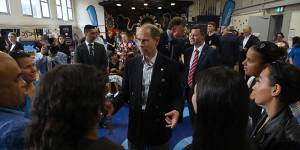 Prince Edward talks with people at the PCYC in Woolloomooloo. 