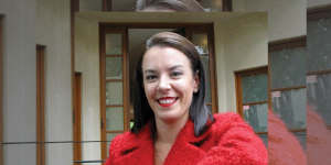 Melissa Caddick in her trademark red.