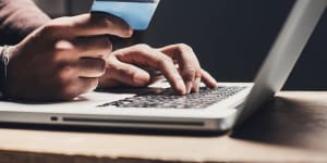 Australians bought $63.3 billion worth of goods online last year,a decline of 2 per cent as households struggled to balance their budgets.