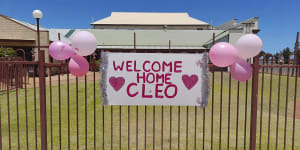 Missing person posters replaced with pink balloons in celebration of Cleo Smith’s return