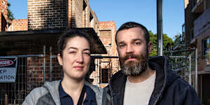 Shellie Atkins and Nick Hardy-Clements walk past the abandoned job site in Allawah each day on their morning commute.