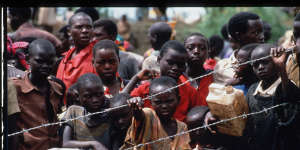 Hutu refugees,fearing reprisals,fled to the Tanzanian border in May 1994.