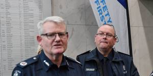Former assistant commissioner Stephen Leane (front) with then chief commissioner Graham Ashton in 2018. 