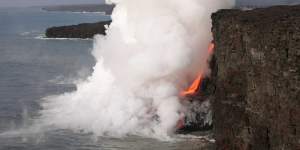 The collapse of solidified lava and sea cliff from Kilauea Volcano in 2005.