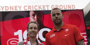 Sydney Swans fan Alex Wheeler giving back the 1000th goal ball to Lance Franklin this morning in Sydney.