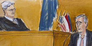 A court sketch of Michael Cohen (right) testifying on the witness stand in Manhattan criminal court.