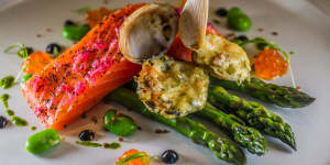 Cured ocean trout with clams and asparagus.