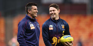Former Brisbane Lions assistant coach Dale Tapping (left) has joined Essendon.