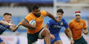 Taniela Tupou bursts past Stephen Varney during last year’s clash with Italy.