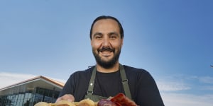 Chef Tom Sarafian with a platter of the Middle Eastern food he’l showcase at the Australian Open 2024.