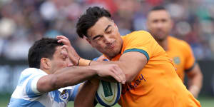 Tackles such as this one on Jordan Petaia could be a thing of the past under new World Rugby laws.