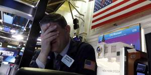 A trader on the floor of the New York Stock Exchange. 