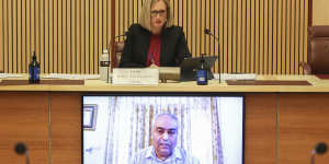 Committee chair Katy Gallagher watches on as Sunny gives video evidence to a Senate hearing on COVID-19.