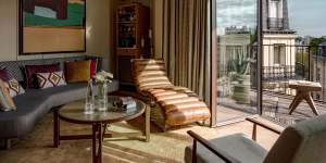 The stylish suites feature modernist art,and custom furnishings offset with antique pieces.