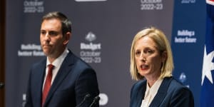 Finance Minister Katy Gallagher with Treasurer Jim Chalmers at the 2022-23 budget press conference. Strong revenues and lower spending means the budget deficit is $20.5 billion lower than expected.