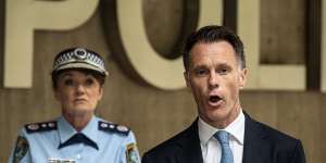 Premier Chris Minns and Police Commissioner Karen Webb speak on Thursday. 