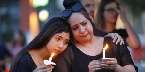 Texans hold candles during a vigil at in McKinney,Texas,after the El Paso massacre. 