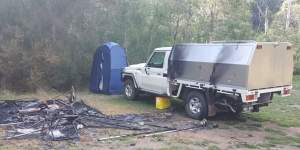 Russell Hill and Carol Clay died in the remote Wonnangatta Valley in 2020. Pictured are Hill’s Toyota LandCruiser and the burnt-out site at Bucks Camp.