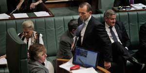 Then-opposition leader Tony Abbott leaves the House after being ejected for an hour by deputy Speaker Anna Burke (left) during question time in 2012. 