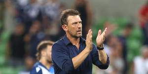 Popovic applauds the Victory fans at AAMI Park.