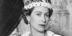 Queen Elizabeth II on her coronation day,wearing the Imperial State Crown.