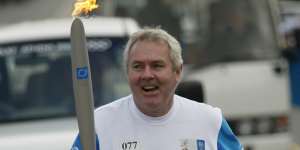  Gary Fenton in the Olympic torch relay. 