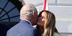 King Charles greets Melania Trump.