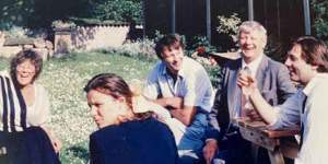 Wood (centre) relaxing at the family home with her mum and dad,Elsie and Geoff,and her brothers David (left) and Geoff (right),in 1985.