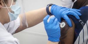 A pharmacist administers the Pfizer COVID-19 vaccination in Jackson,Mississippi. 