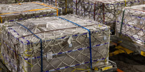 Pallets of Bubs baby formula sit ready for loading onto a cargo plane at Melbourne Airport last month.