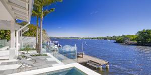 The two-level luxury house at Noosa Heads has four bedrooms.