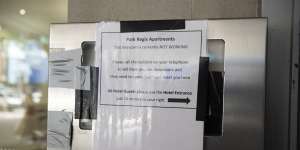 The sign on the broken intercom of the Park Regis apartments tells the story. 