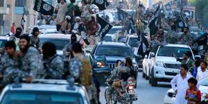 Islamic State fighters parade in Raqqa,Syria.