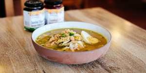 Soto ayam Ambengan,a turmeric-powered chicken noodle soup that originated in the Javanese port city of Surabaya.