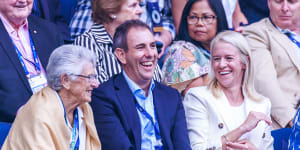 Treasurer Jim Chalmers started the week at the Australian Open men’s final on Sunday night with his wife Laura,right.