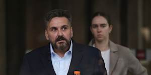 Convicted fraudster George Alex leaves court in Sydney. He was granted bail last year despite a hefty prison sentence.
