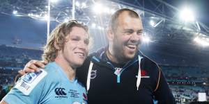 Michael Cheika and Michael Hooper celebrate victory over the Crusaders in the Super Rugby decider in 2014.