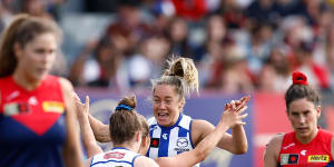 Dee-molition:Melbourne held to one goal in finals upset;Skipper leads Cats to win days after losing dad