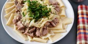 Beshbarmak. To my palate,boiled horse meat with pasta sheets and stewed onions is not very tasty.